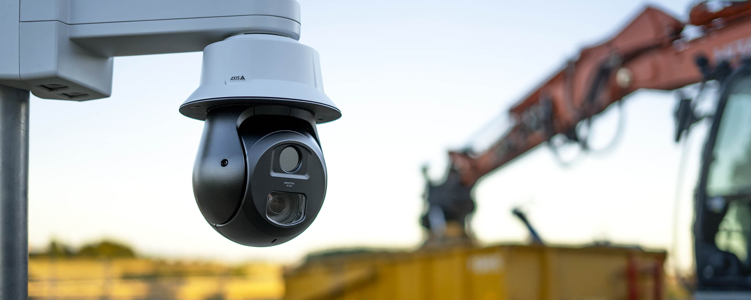 AXIS Q6411-LE PTZ Video Camera at an outdoor construction site.